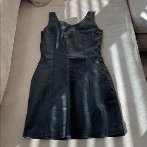 Black leather mini dress.